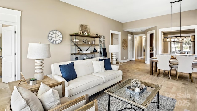 7324 Jolly Brook Dr, Charlotte, NC 28215 - living room featuring light wood-type flooring and baseboards
