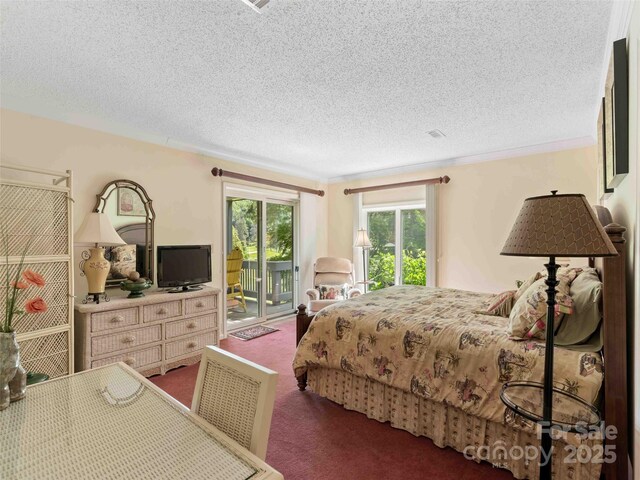 bedroom featuring access to exterior, carpet floors, a textured ceiling, and ornamental molding