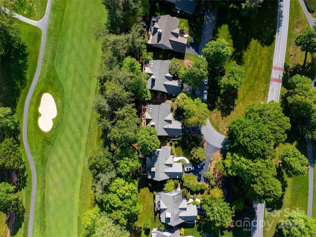 aerial overview of property's location with nearby suburban area