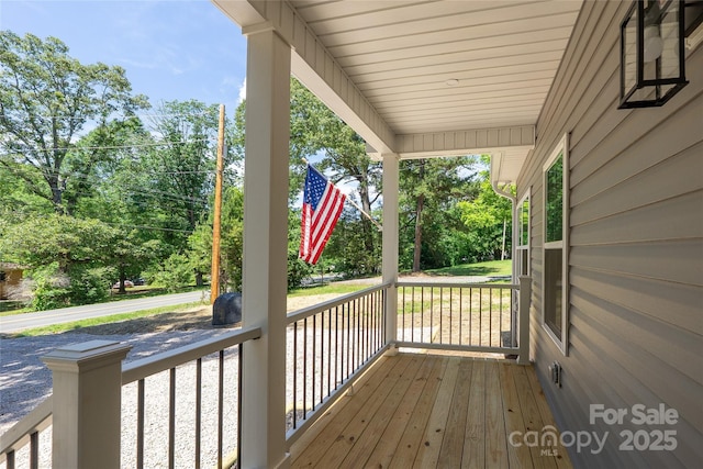 7426 Hambright Rd, Huntersville, NC 28078 - porch featuring view of wooded area