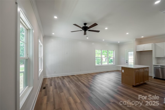 7426 Hambright Rd, Huntersville, NC 28078 - unfurnished living room with crown molding, dark wood finished floors, ceiling fan, baseboards, and recessed lighting