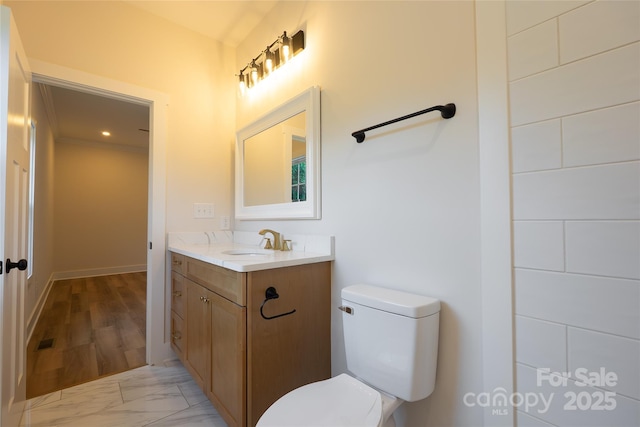 7426 Hambright Rd, Huntersville, NC 28078 - bathroom with vanity, toilet, and marble look tiles