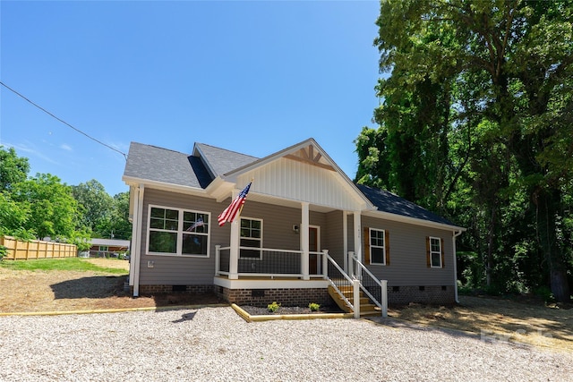 7426 Hambright Rd, Huntersville, NC 28078 - view of front of house featuring crawl space, a porch, and a shingled roof