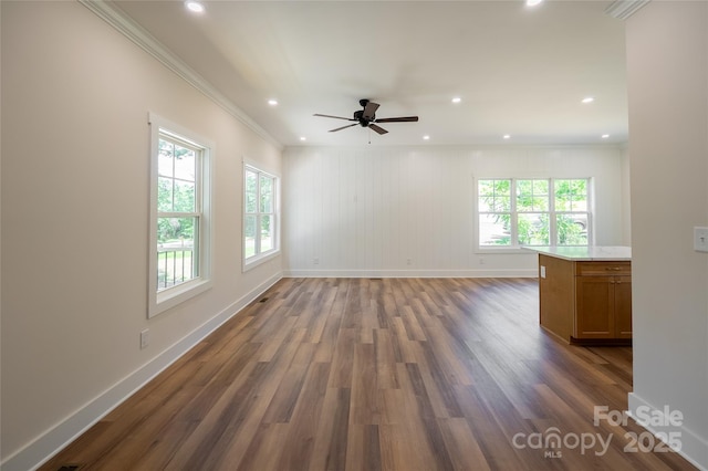 7426 Hambright Rd, Huntersville, NC 28078 - spare room with ornamental molding, baseboards, dark wood-style flooring, ceiling fan, and recessed lighting