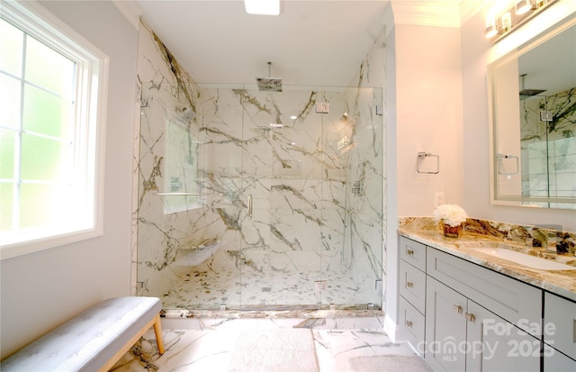 full bathroom featuring a marble finish shower, vanity, and marble look tiles
