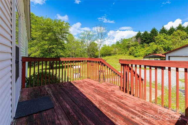 283 Grandview Dr Unit 1, Marshall, NC 28753 - wooden terrace with a lawn