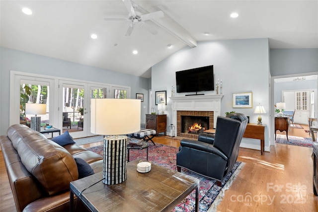 216 Saint Andrews Blvd, Campobello, SC 29322 - living room with beamed ceiling, light wood-style flooring, healthy amount of natural light, a fireplace, and recessed lighting
