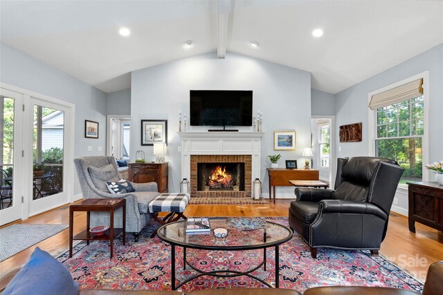 216 Saint Andrews Blvd, Campobello, SC 29322 - living room featuring wood finished floors, a fireplace, plenty of natural light, and recessed lighting