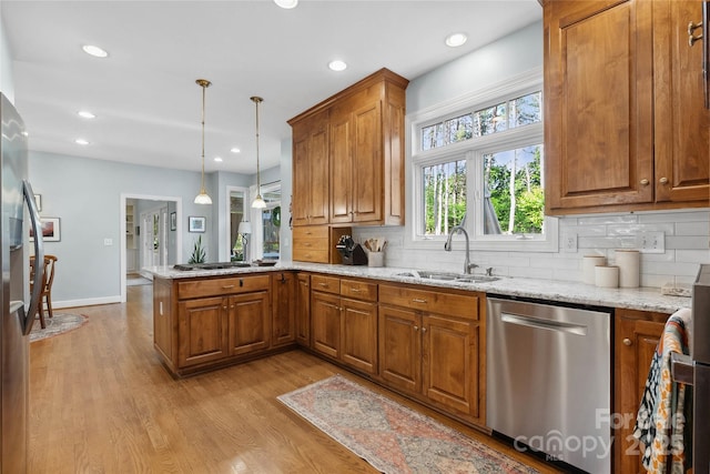 216 Saint Andrews Blvd, Campobello, SC 29322 - kitchen featuring stainless steel appliances, brown cabinetry, and recessed lighting