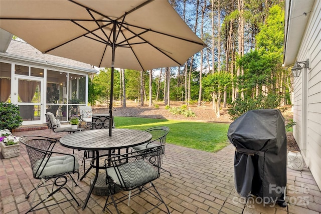216 Saint Andrews Blvd, Campobello, SC 29322 - view of patio with area for grilling, a sunroom, and outdoor dining area