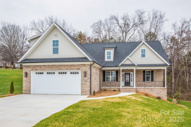 149 Beauchamp Oaks Ct, Advance, NC 27006 - view of front of home featuring brick siding, a porch, driveway, a front yard, and roof with shingles