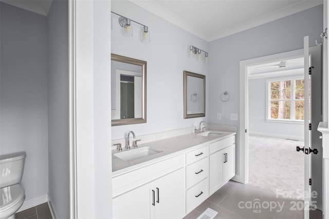 149 Beauchamp Oaks Ct, Advance, NC 27006 - full bath with toilet, double vanity, baseboards, and tile patterned floors