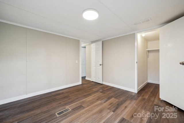 below grade area with wood finished floors and baseboards