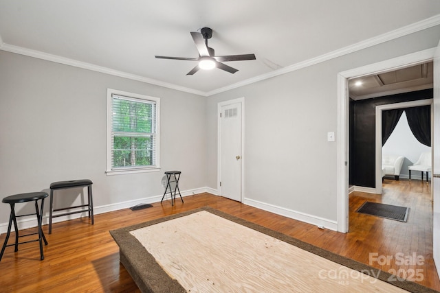 1917 Tom Sadler Rd, Charlotte, NC 28214 - bedroom featuring crown molding, wood finished floors, and attic access