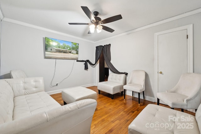 1917 Tom Sadler Rd, Charlotte, NC 28214 - living room with wood finished floors, a ceiling fan, and crown molding