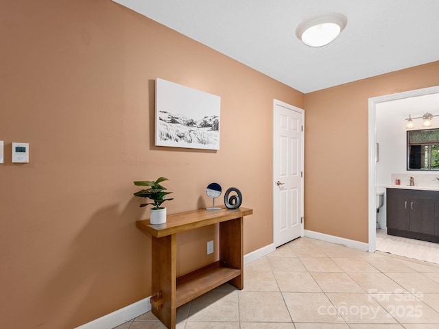 42 Hollybrook Dr, Asheville, NC 28803 - corridor with baseboards and light tile patterned floors