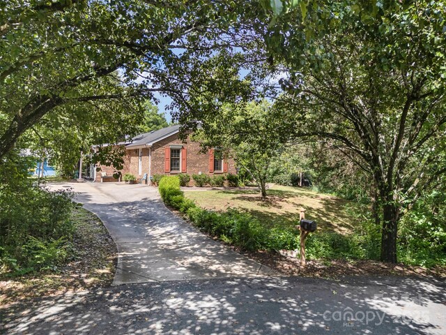 8544 Houston Ridge Rd, Charlotte, NC 28277 - view of front of house with concrete driveway and brick siding
