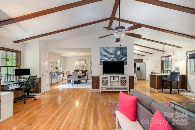 8544 Houston Ridge Rd, Charlotte, NC 28277 - living room featuring a desk, light wood-style floors, ceiling fan, and a chandelier