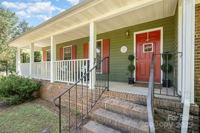 8544 Houston Ridge Rd, Charlotte, NC 28277 - entrance to property with a porch