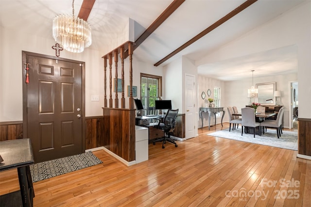 8544 Houston Ridge Rd, Charlotte, NC 28277 - entryway with wood-type flooring, a chandelier, wainscoting, and wooden walls