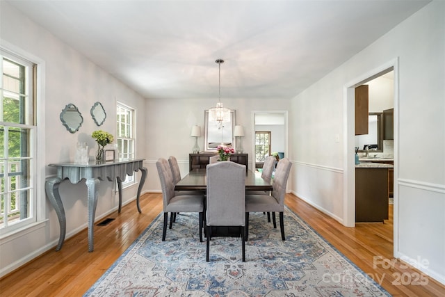 8544 Houston Ridge Rd, Charlotte, NC 28277 - dining area with light wood finished floors and baseboards