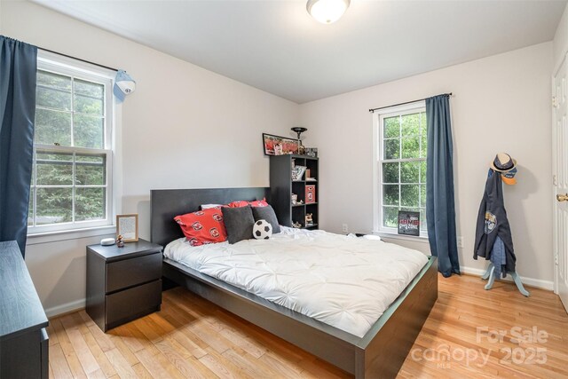 8544 Houston Ridge Rd, Charlotte, NC 28277 - bedroom featuring light wood finished floors and baseboards