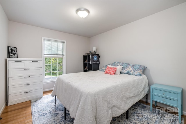 8544 Houston Ridge Rd, Charlotte, NC 28277 - bedroom featuring light wood-type flooring and baseboards