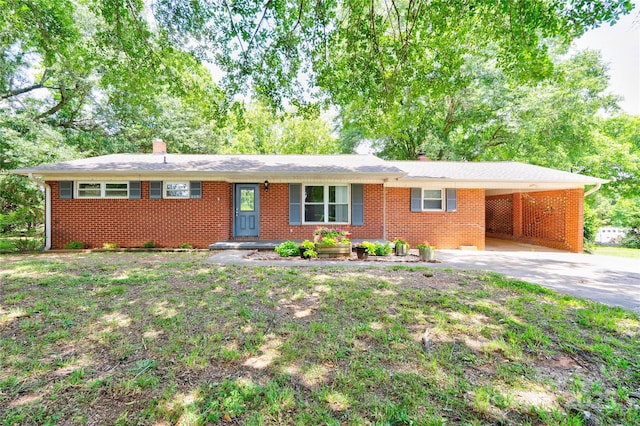 619 E Sanders Rd, Shelby, NC 28150 - ranch-style house featuring a chimney, concrete driveway, an attached carport, and brick siding