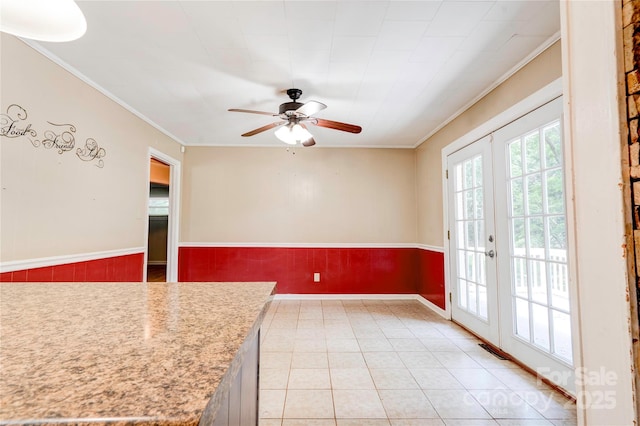 619 E Sanders Rd, Shelby, NC 28150 - unfurnished dining area with ceiling fan, french doors, crown molding, wainscoting, and light tile patterned floors