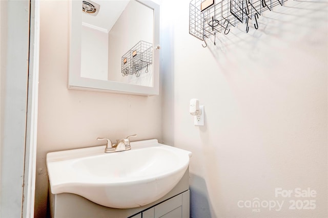 619 E Sanders Rd, Shelby, NC 28150 - bathroom with vanity and crown molding