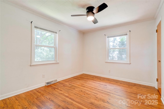 619 E Sanders Rd, Shelby, NC 28150 - spare room featuring light wood-style flooring, crown molding, baseboards, and a ceiling fan