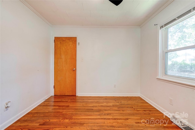 619 E Sanders Rd, Shelby, NC 28150 - empty room featuring ornamental molding, light wood-style flooring, and baseboards