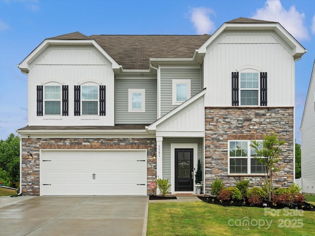 5581 Soft Shell Dr, Lancaster, SC 29720 - view of front facade featuring concrete driveway, an attached garage, stone siding, and a shingled roof