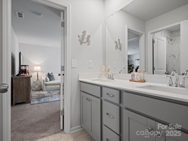 5581 Soft Shell Dr, Lancaster, SC 29720 - bathroom with connected bathroom, double vanity, a shower, and tile patterned floors