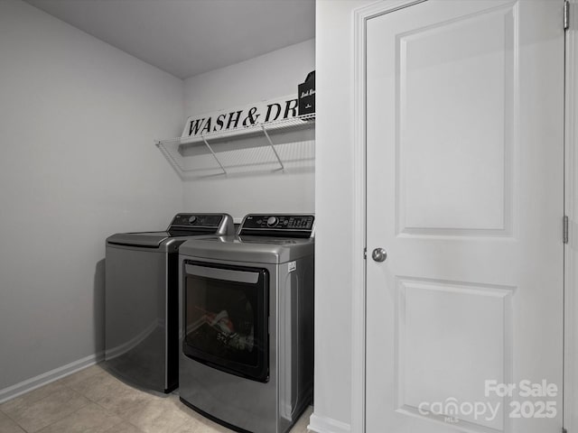 5581 Soft Shell Dr, Lancaster, SC 29720 - washroom featuring washing machine and dryer and baseboards