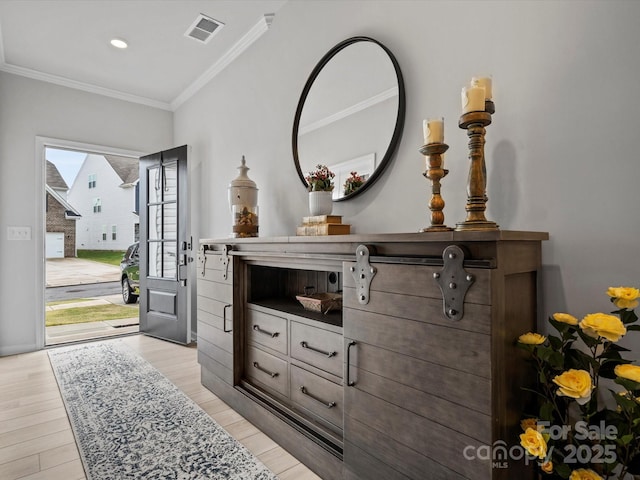 5581 Soft Shell Dr, Lancaster, SC 29720 - entryway with ornamental molding and light wood-style flooring