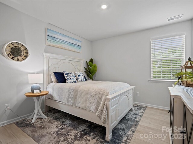 5581 Soft Shell Dr, Lancaster, SC 29720 - bedroom featuring baseboards and light wood-type flooring