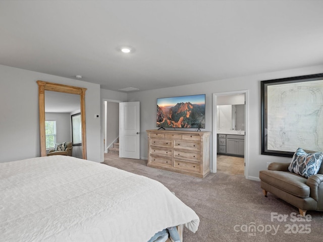 5581 Soft Shell Dr, Lancaster, SC 29720 - bedroom featuring light colored carpet, baseboards, and ensuite bathroom