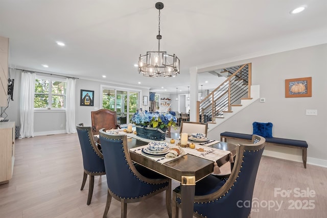 685 Knollcrest Dr NE, Concord, NC 28025 - dining room with a chandelier, stairs, baseboards, light wood-style flooring, and recessed lighting