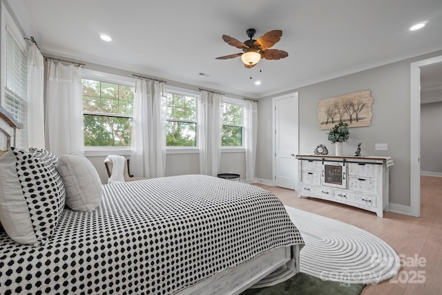 685 Knollcrest Dr NE, Concord, NC 28025 - bedroom with multiple windows, recessed lighting, baseboards, light wood finished floors, and a ceiling fan