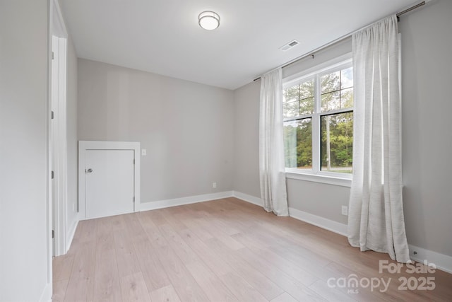 685 Knollcrest Dr NE, Concord, NC 28025 - empty room with light wood-style flooring and baseboards