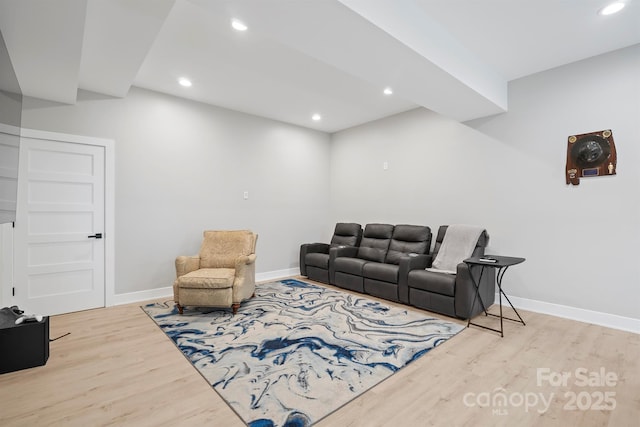 685 Knollcrest Dr NE, Concord, NC 28025 - living room featuring wood finished floors, recessed lighting, and baseboards