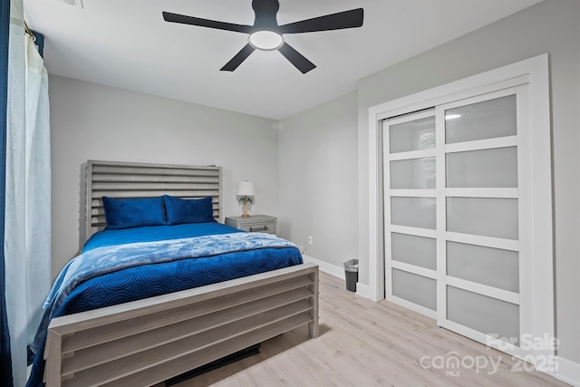 685 Knollcrest Dr NE, Concord, NC 28025 - bedroom featuring wood finished floors, baseboards, and ceiling fan