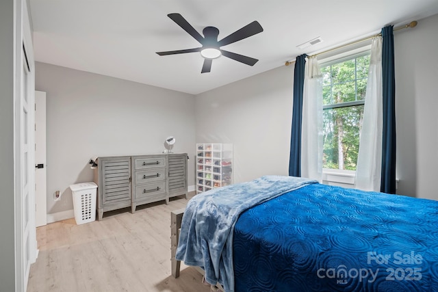 685 Knollcrest Dr NE, Concord, NC 28025 - bedroom featuring wood finished floors, baseboards, and a ceiling fan