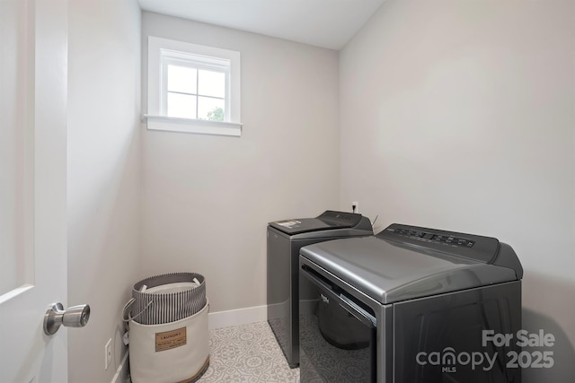 685 Knollcrest Dr NE, Concord, NC 28025 - washroom with washing machine and dryer and baseboards