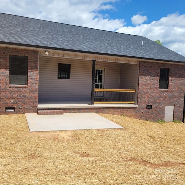 8222 Madison Ln, Hickory, NC 28602 - rear view of house featuring crawl space, roof with shingles, and brick siding