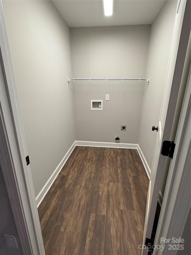 8222 Madison Ln, Hickory, NC 28602 - clothes washing area with hookup for a washing machine, hookup for an electric dryer, dark wood-type flooring, and baseboards