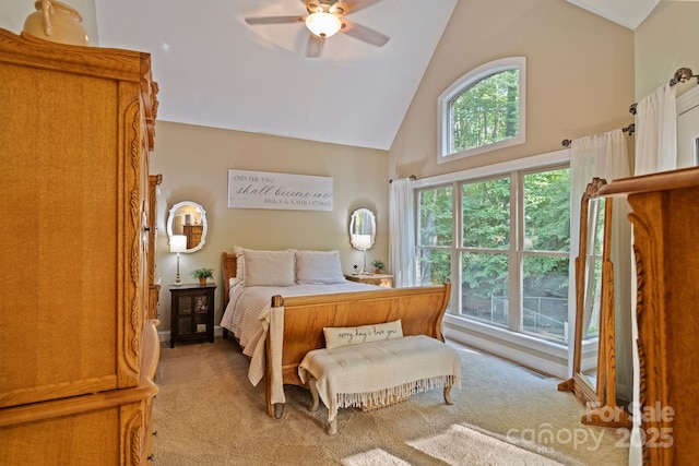 131 Sierra Woods Dr, Troutman, NC 28166 - bedroom with light carpet, high vaulted ceiling, and a ceiling fan