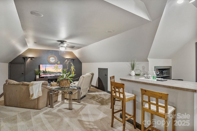 131 Sierra Woods Dr, Troutman, NC 28166 - carpeted cinema featuring lofted ceiling, a ceiling fan, and baseboards
