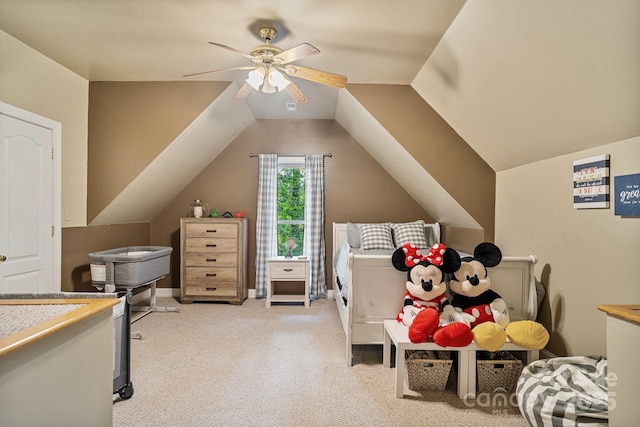 131 Sierra Woods Dr, Troutman, NC 28166 - bedroom featuring light colored carpet, vaulted ceiling, and a ceiling fan